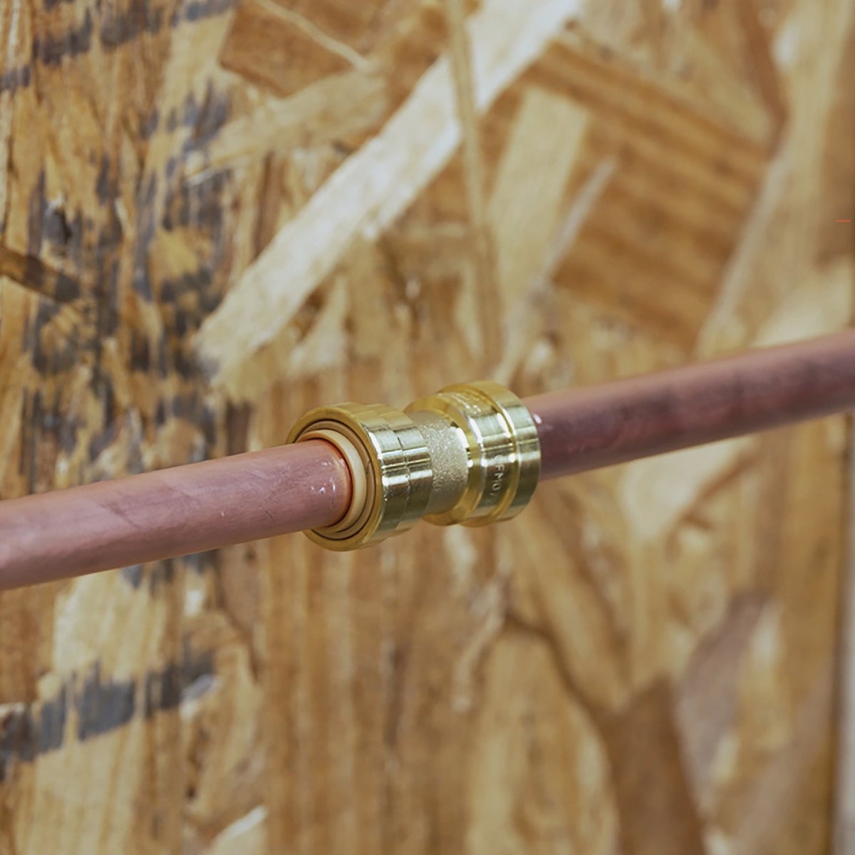 QuickFitting 3/8 In. x 1/2 In. Push-to-Connect Brass Reducing Coupling Image 2