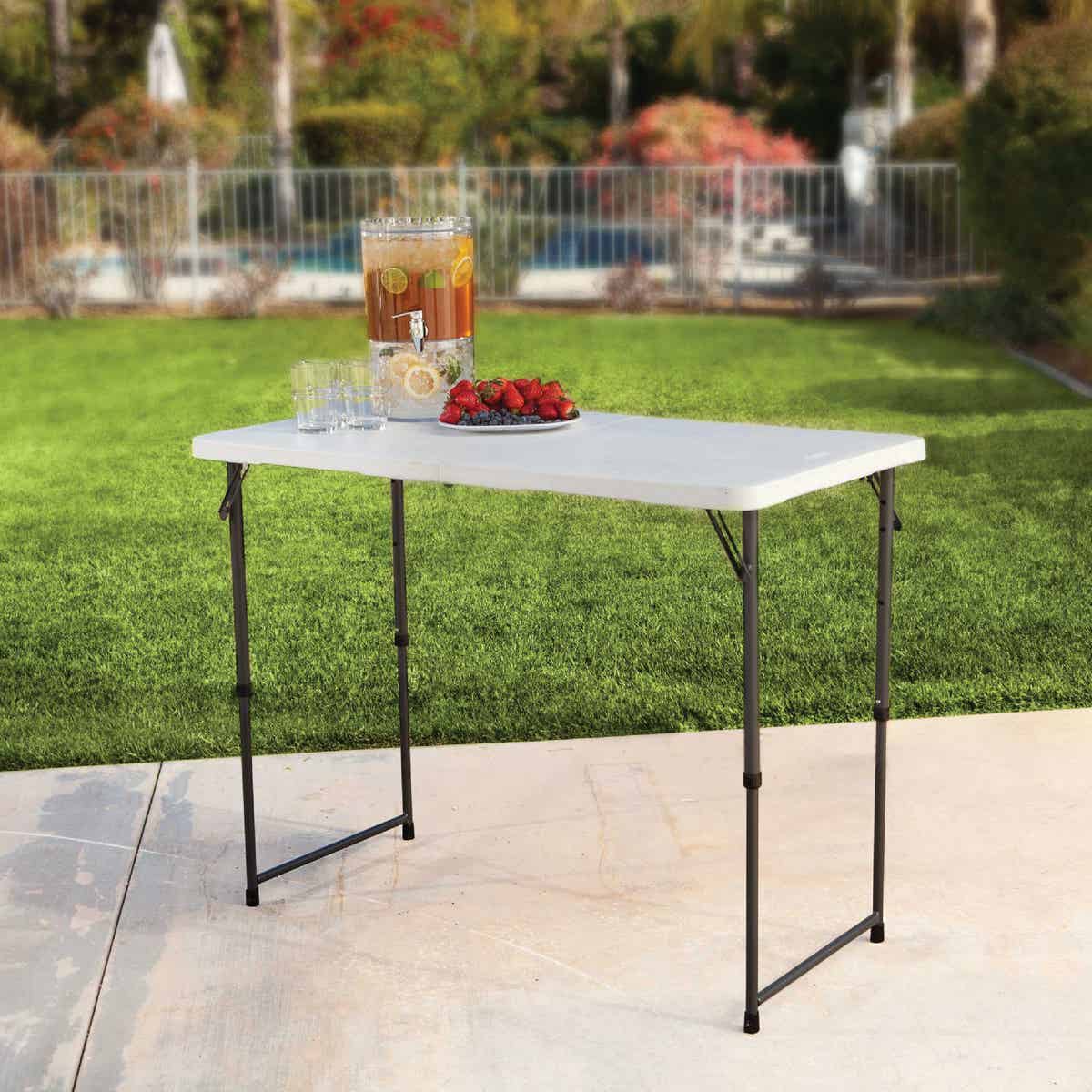 Lifetime 4 Ft. x 24 In. White Granite Light Commercial Fold-In-Half Table Image 2